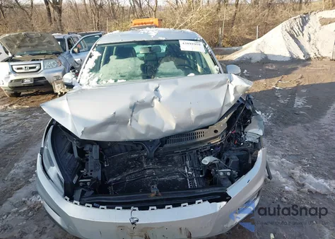 2012 Volkswagen Tiguan Le z USA, uszkodzony, nr VIN WVGAV7AX7CW577003